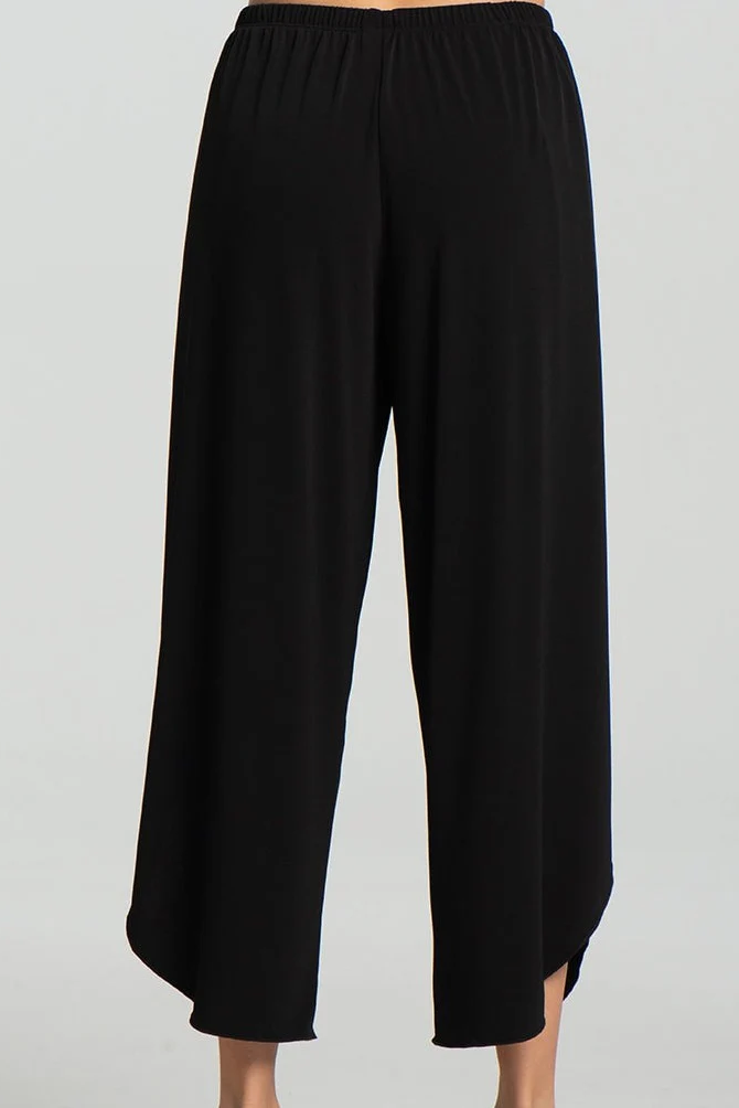 Miley Pants by Kollontai, Black, back view, wide slightly cropped legs, angled tulip hems, elastic waist, lightweight, sizes XS to XXL, made in Montreal