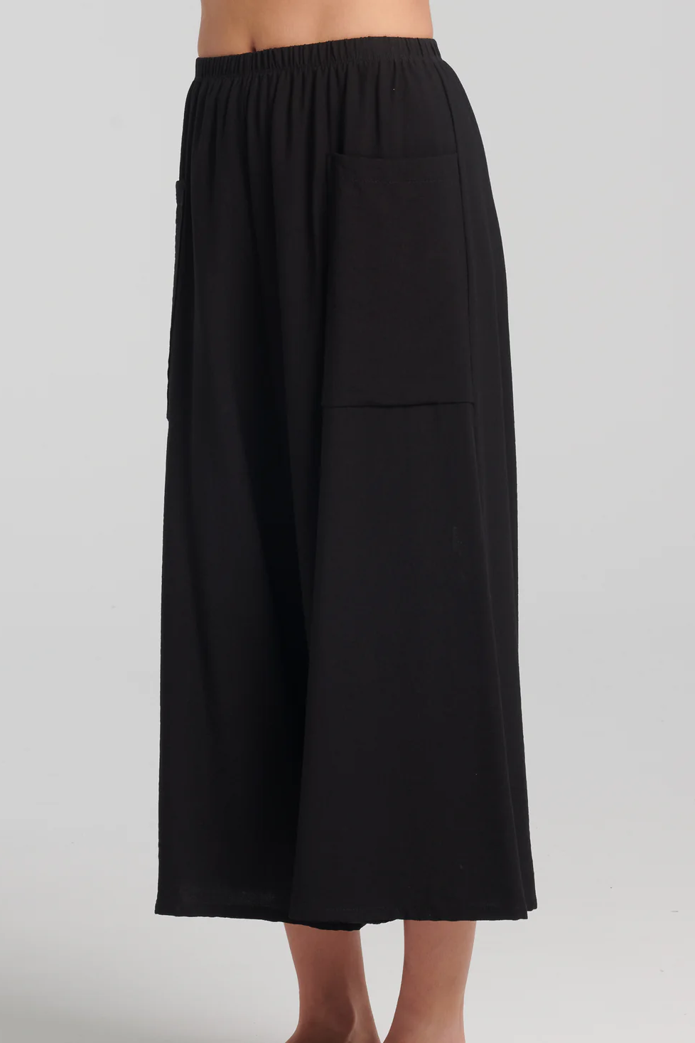 Ishtar Pants by Kollontai, Black, cropped, very wide legs, elastic waist, patch pockets, lightweight rayon knit, sizes XS to XXL, made in Montreal