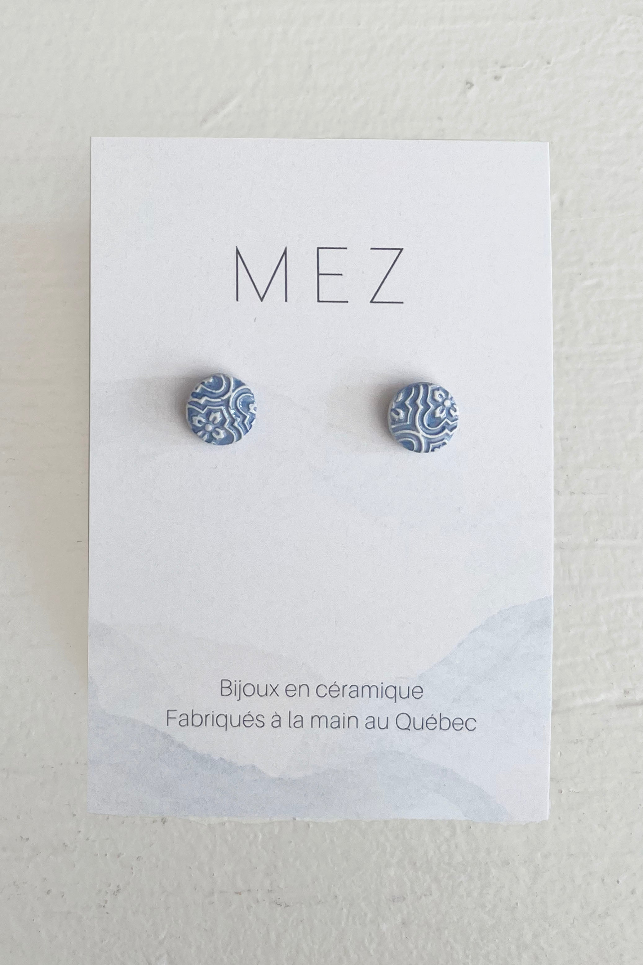 Blue white floral round studs