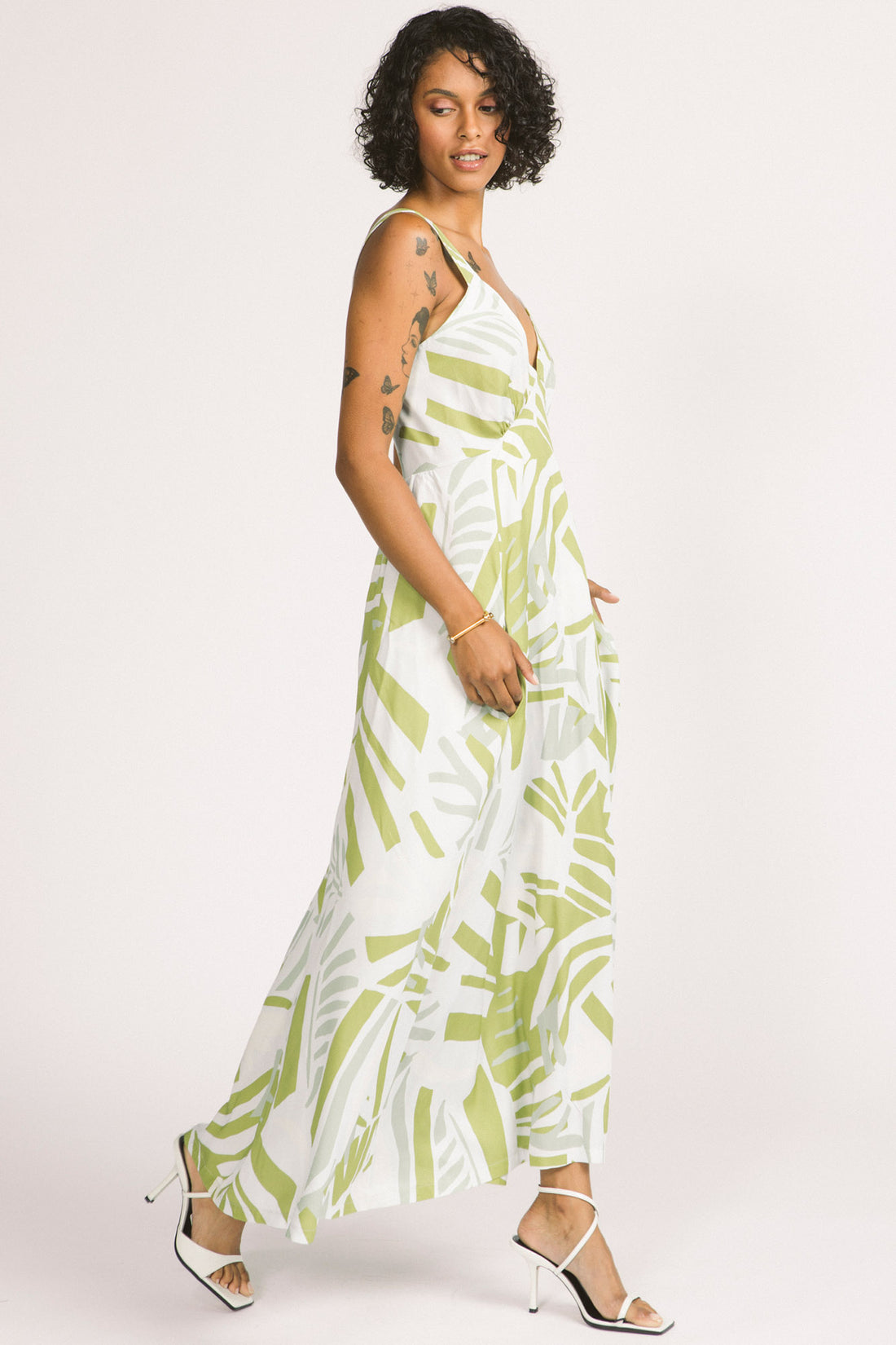 Alora Dress by Allison Wonderland, Frond Leaf, side view, wide straps, deep V-neckline, gathers on underbust seams, in-seam pockets, maxi skirt, eco-fabric, Lenzing Ecovero Viscose, sizes 2-12, made in Vancouver 