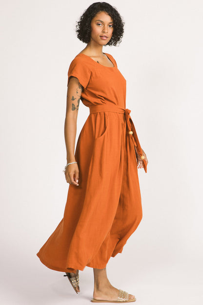 Enola Dress by Allison Wonderland, Rust, voluminous maxi dress, scoop neck front and back, short raglan sleeves, front horizontal seam with gathers below the natural waist, pockets, matching belt, eco-fabric, viscose, linen, sizes 2-12, made in Vancouver