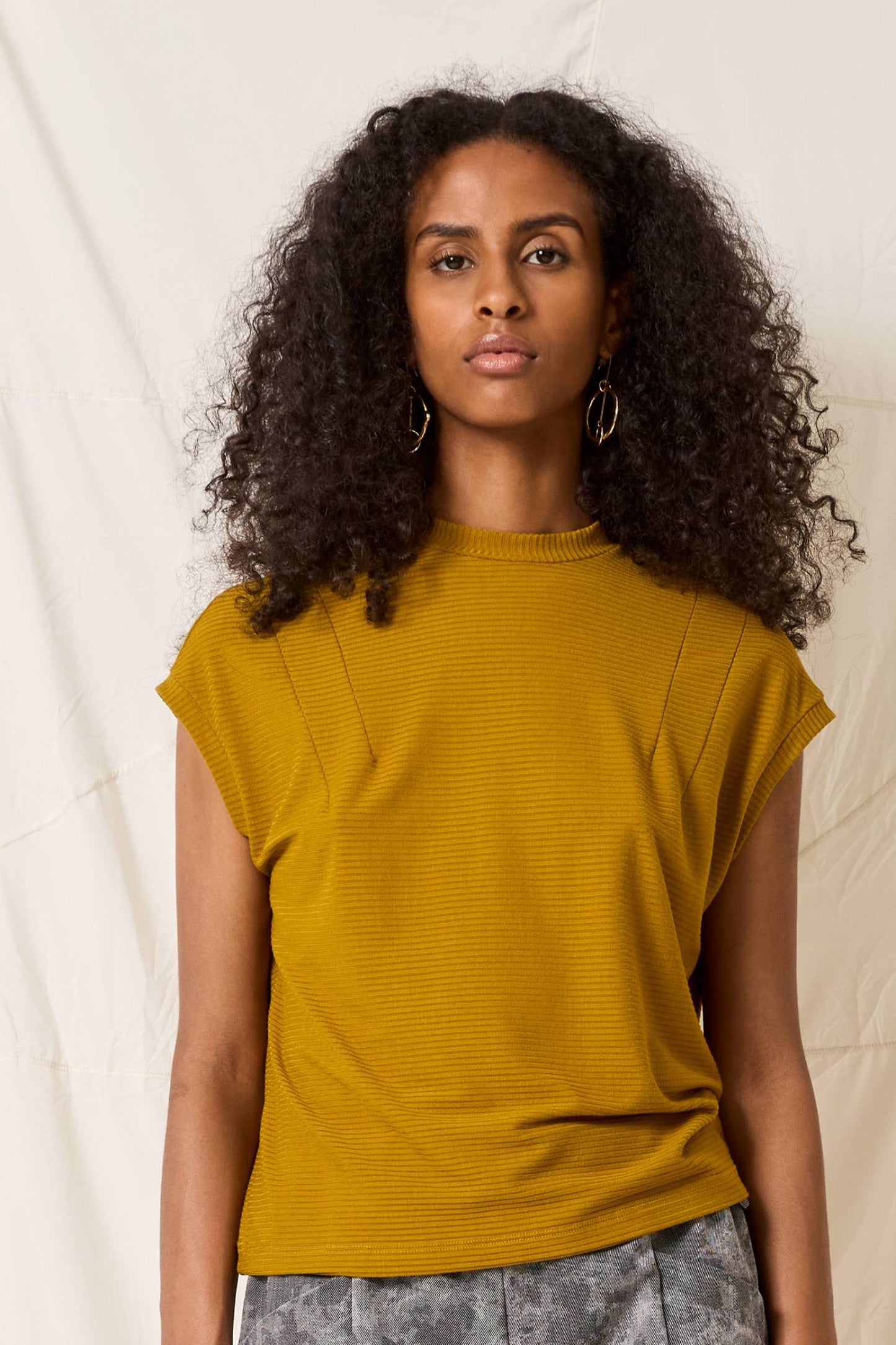Sumac Top by Cokluch, Curry, short dropped sleeves, small stand up collar, darts at front of shoulders, bamboo rayon rib knit, eco-fabric, OEKO-TEX certified, sizes XS to XL, made in Montreal