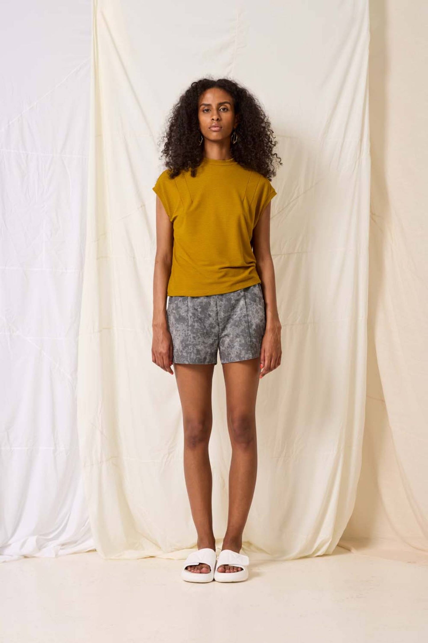 Sumac Top by Cokluch, Curry, short dropped sleeves, small stand up collar, darts at front of shoulders, bamboo rayon rib knit, eco-fabric, OEKO-TEX certified, sizes XS to XL, made in Montreal