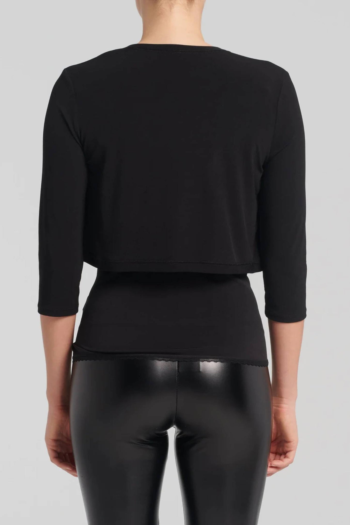 Melika Bolero by Kollontai, Black, back view, 3/4 sleeves, slightly cropped length, rounded hem is shorter in the front, sizes XS to XXL, made in Montreal