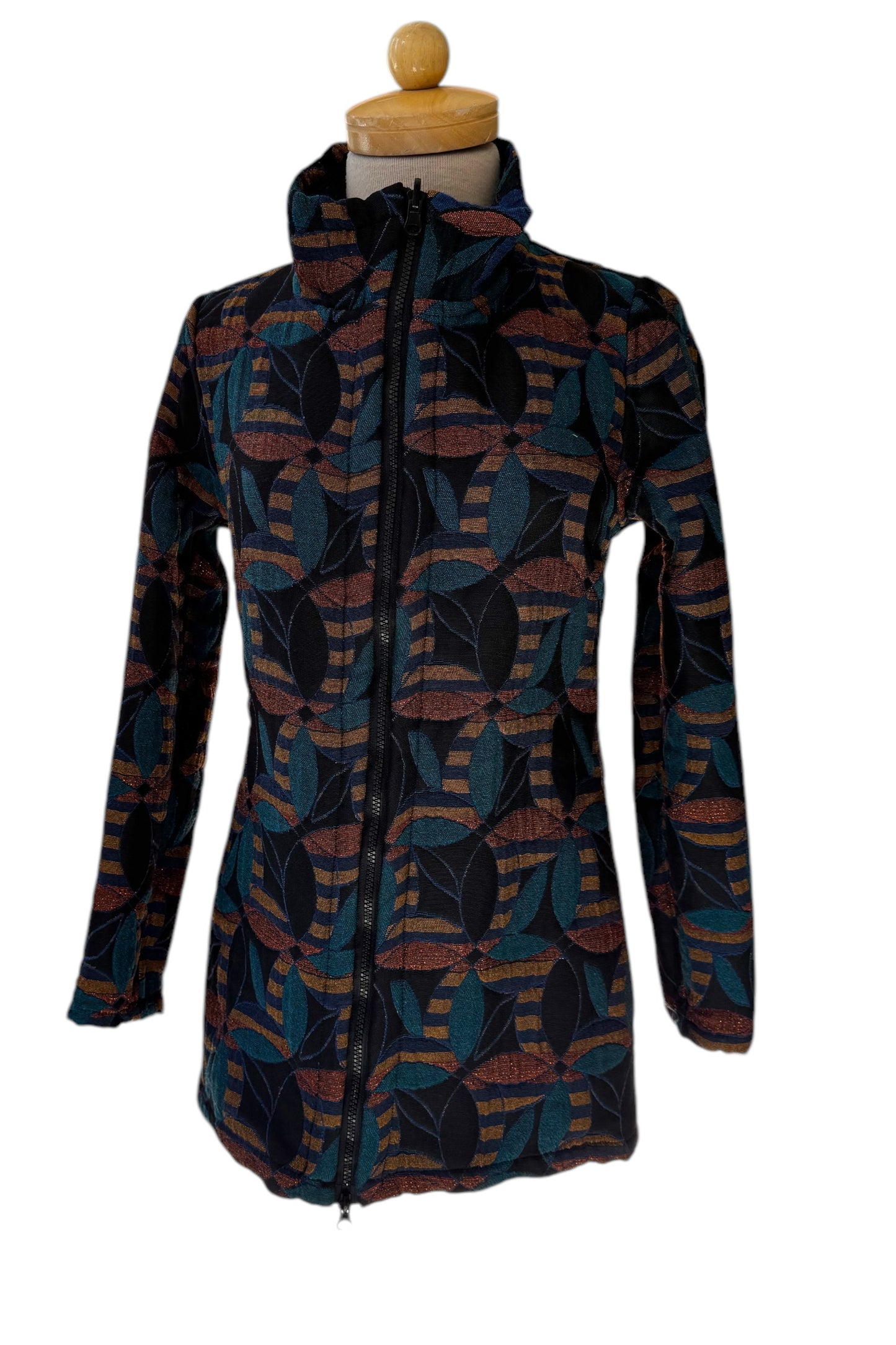 The 3/4 Reversible Jacket Mosaic Flowers by Veronique d'Aragon in Blue, with a high collar and a zip front, is shown on a mannequin against a white background.