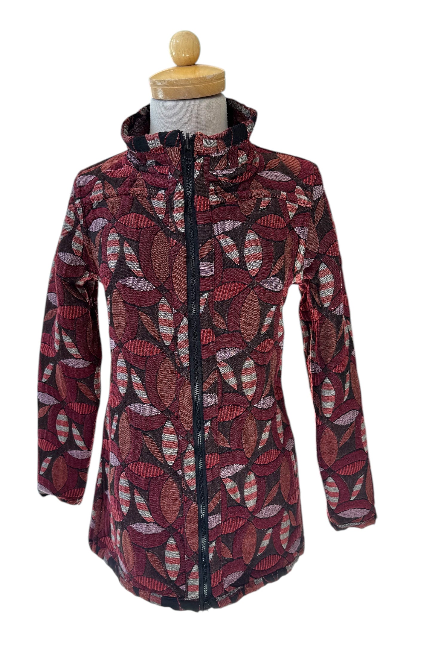 The 3/4 Reversible Jacket Mosaic Flowers by Veronique d'Aragon in Maroon, with a high collar and a zip front, is shown on a mannequin against a white background.