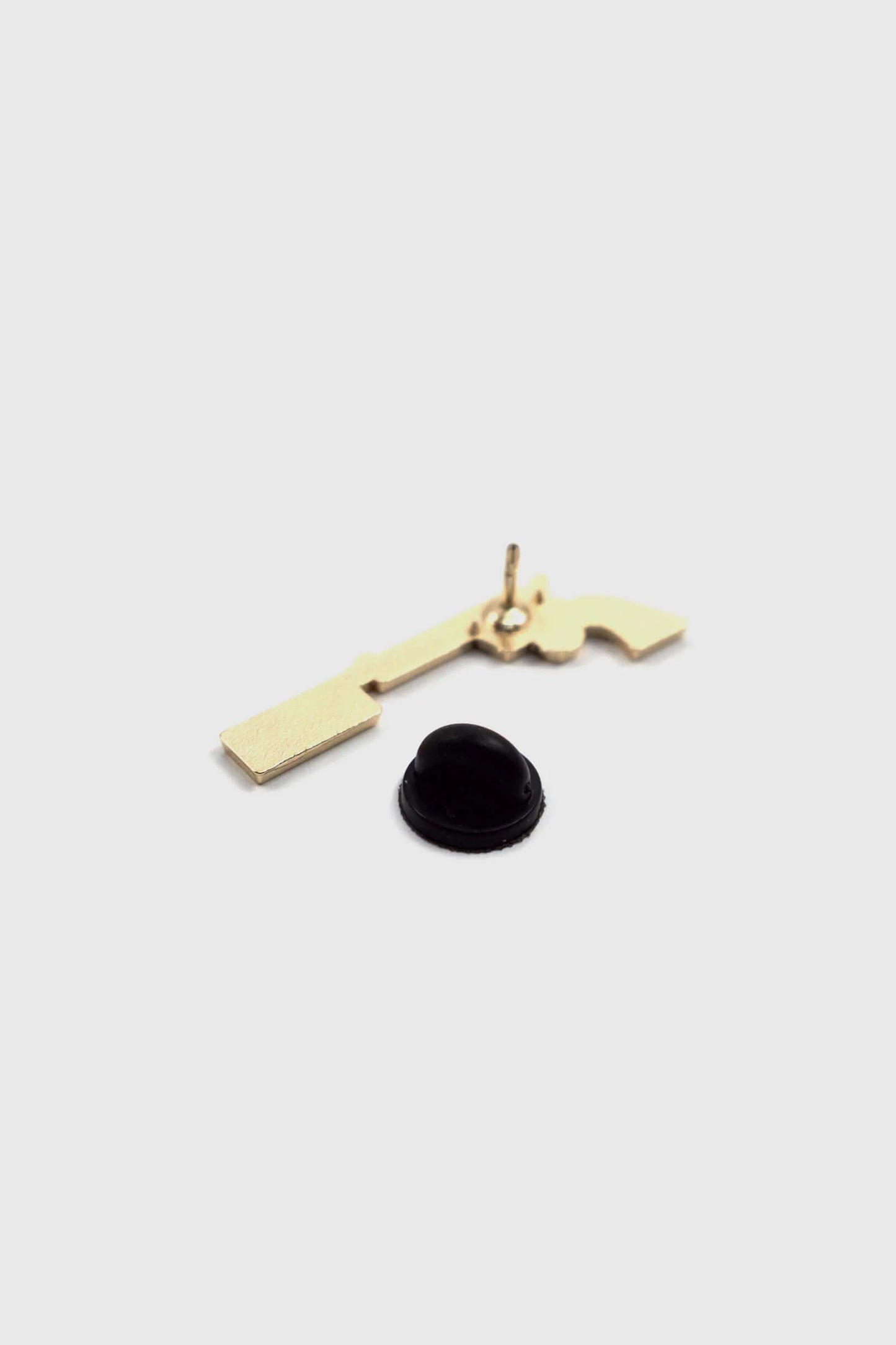 A back view of The Bad Bitch Pin by Badaboöm Studio is shown against a white background.