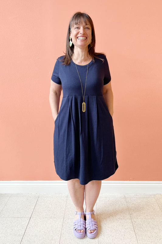 Caitlin Dress by Pure Essence, Navy, round neck, short sleeves, baby-doll style, gathers at waist, pockets, knee-length, sizes XS to XXL, made in Canada
