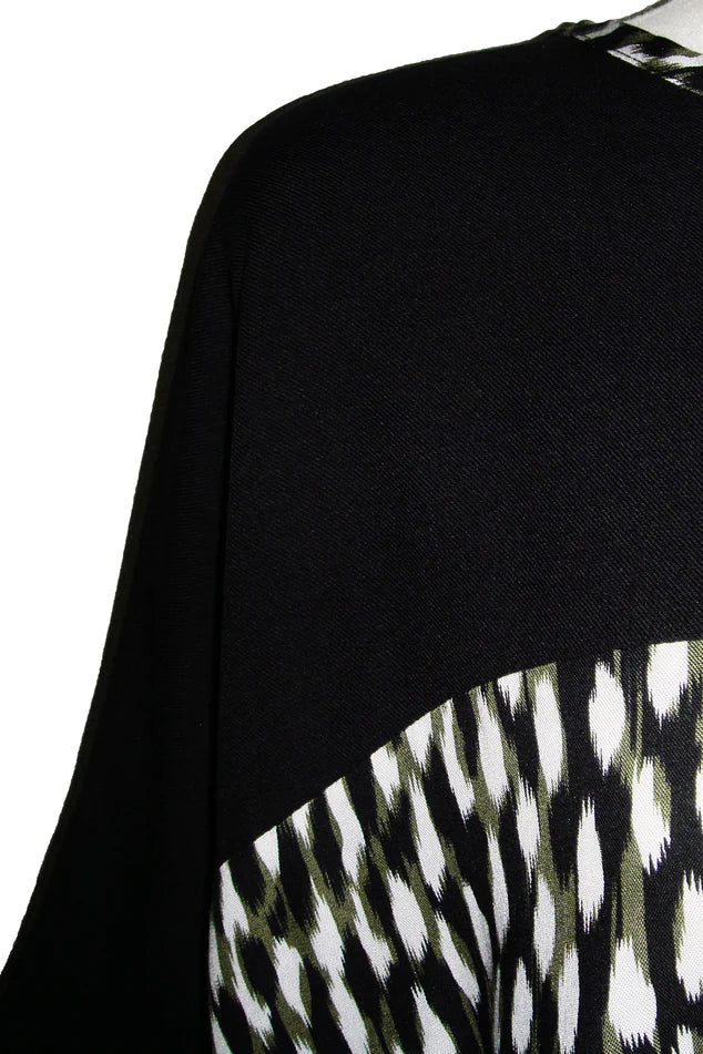 Close up detail of the Chloe Top by Desserts and Skirts in Brush Green.