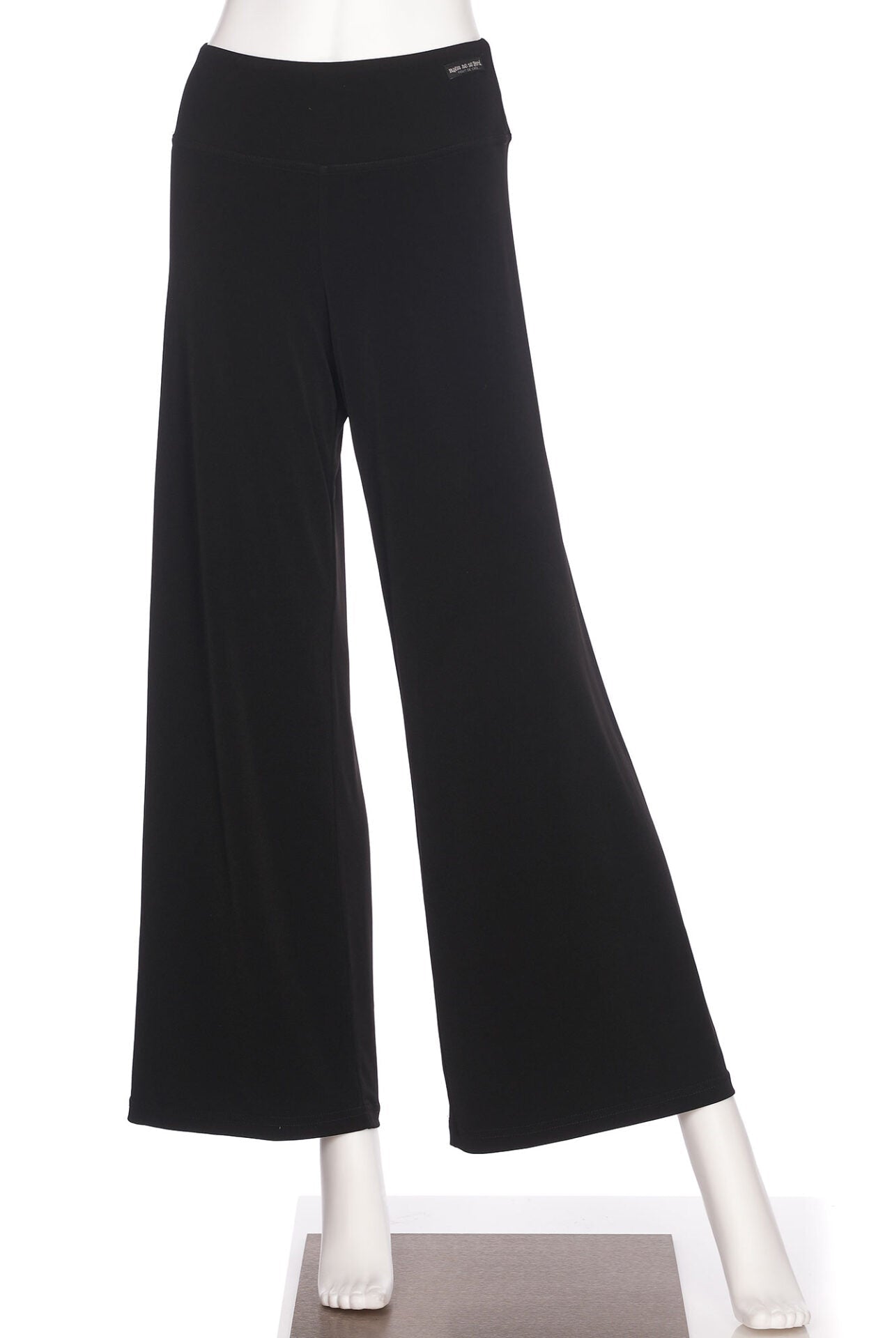 The Rumba Palazzo Pants in Black are shown on a mannequin in front of a white background.
