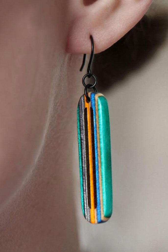 Pier dangle earrings made from repurposed skateboards