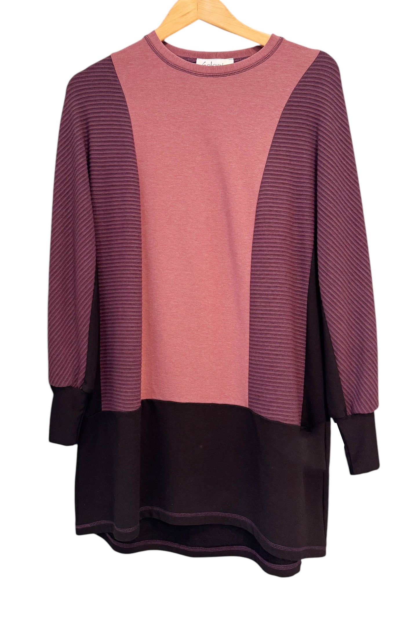 The Viola Tunic by Solomia in Burgundy/Black/Old Rose, a colour-blocked piece featuring long, a round neckline, and a mid-thigh length, is shown against a white background.