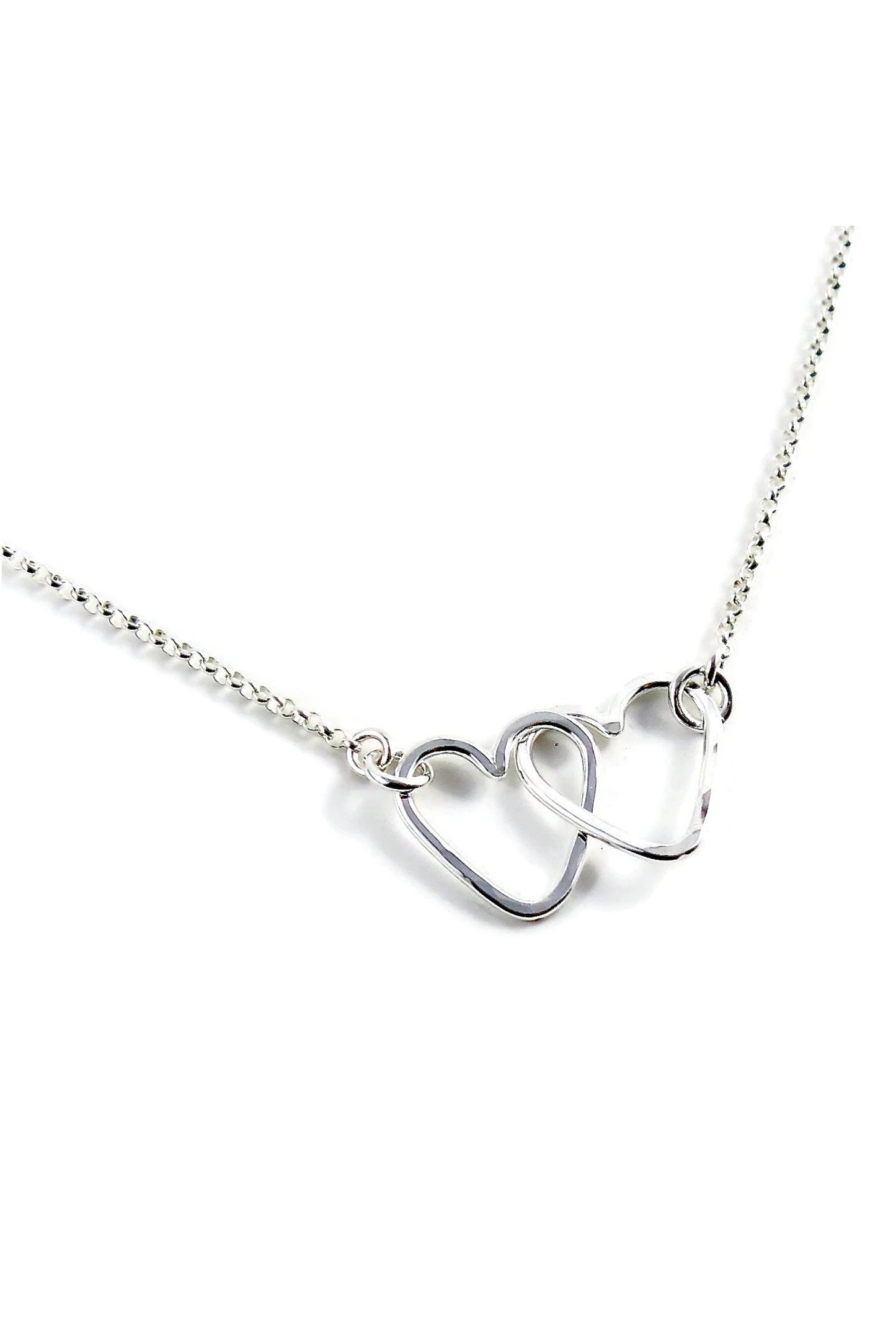 Hearts Embrace Necklace: Sterling Silver