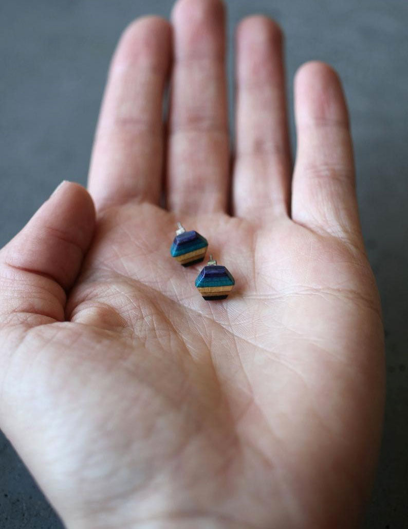 Hexagon stud earrings made from repurposed skateboards