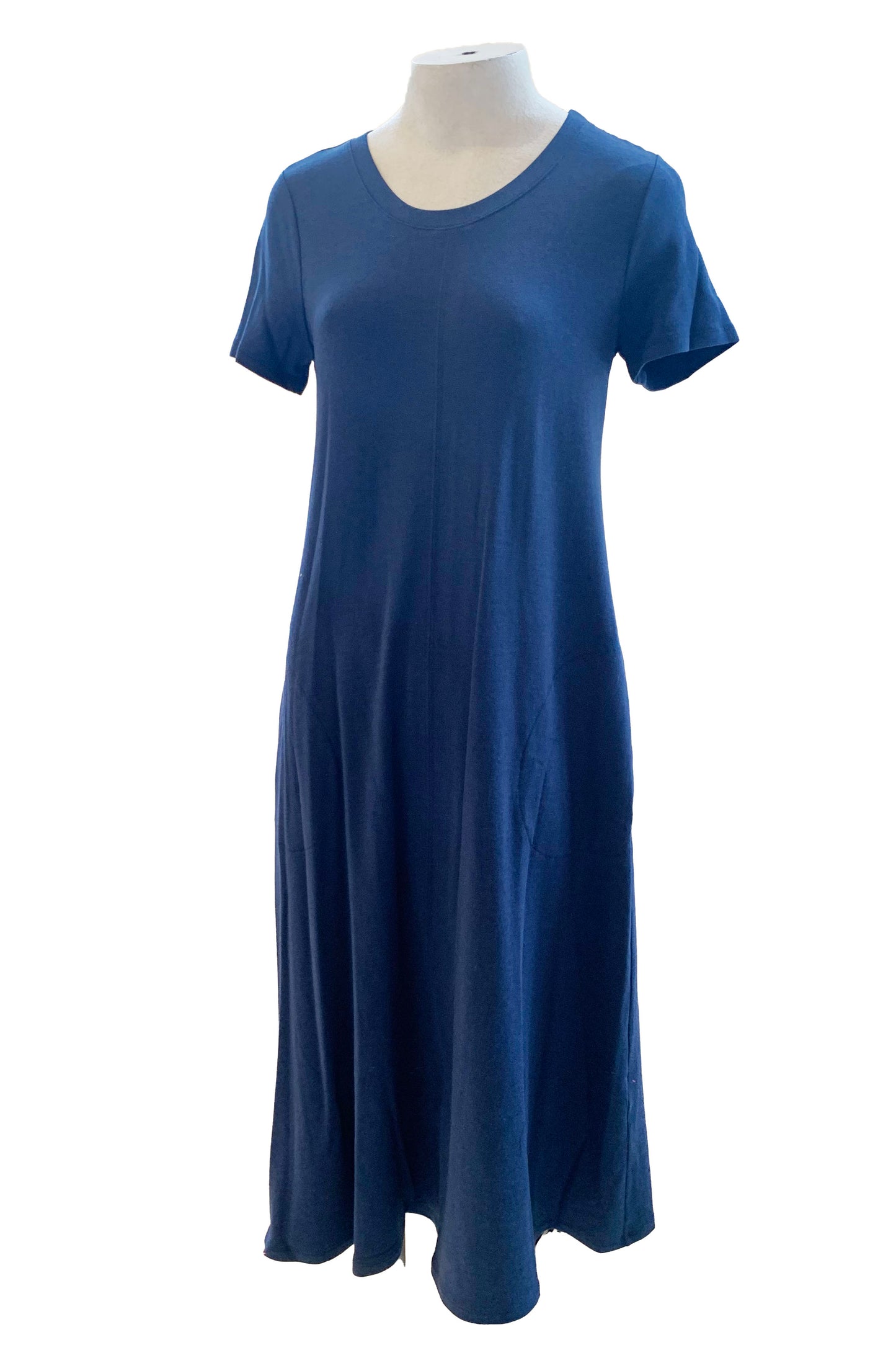 The Chloe Dress by Pure Essence in Navy is shown on a mannequin in front of a white background 