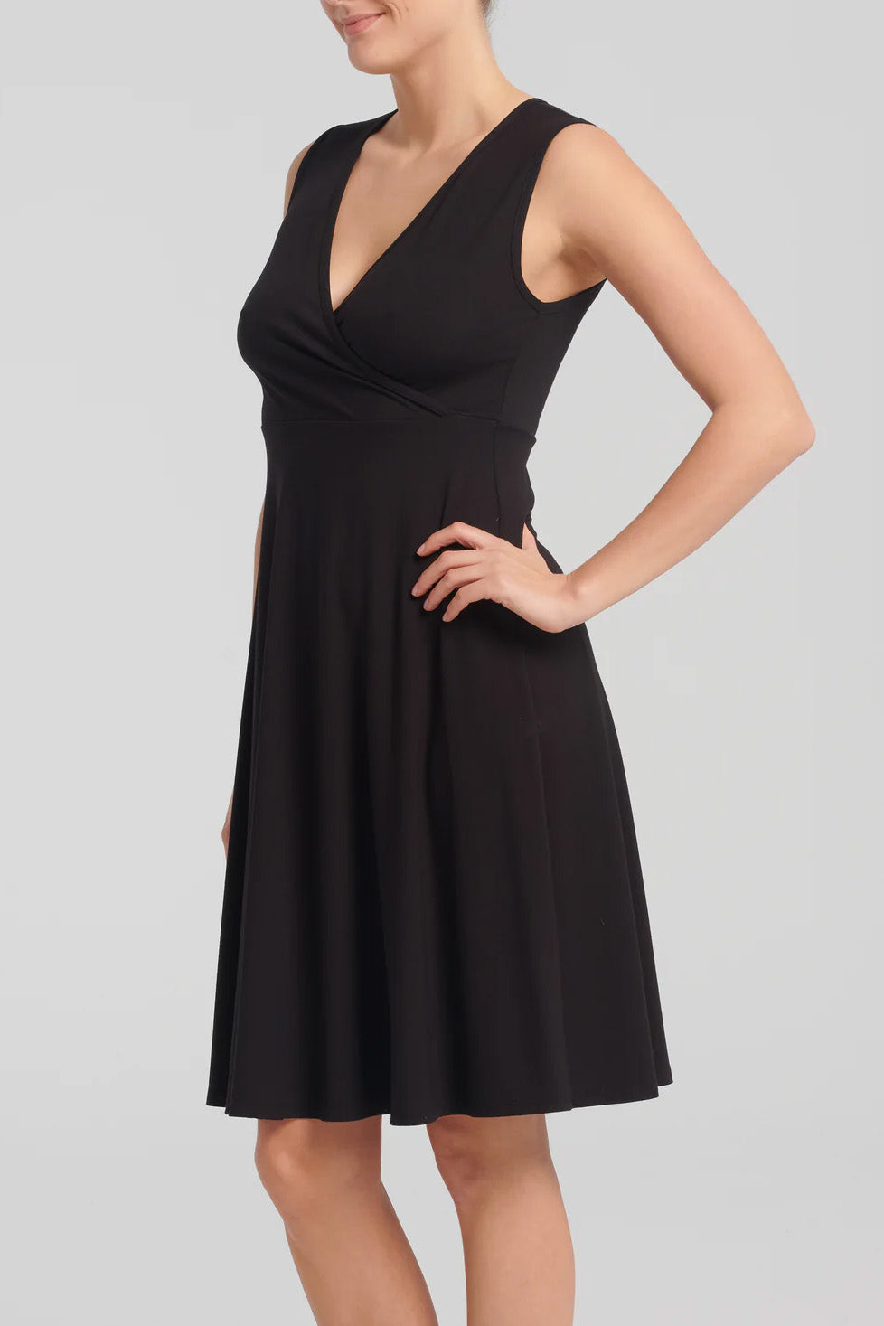 Ayesha Dress by Kollontai, Black, wrap-over neckline, wide straps, empire waist, loose fit through the bodice, knee-length, pill-resistant viscose, sizes XS-XXL, made in Quebec