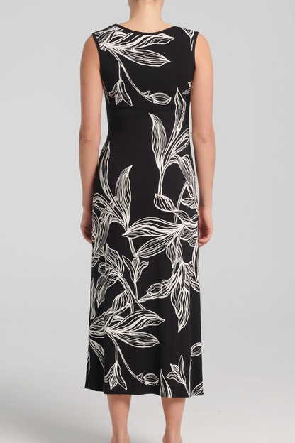 Hemera Dress by Kollontai, Black and White leaf print, back view,  sleeveless, round neck, straight cut, pleats at waist, midi-length, sizes XS to XXL, made in Montreal 