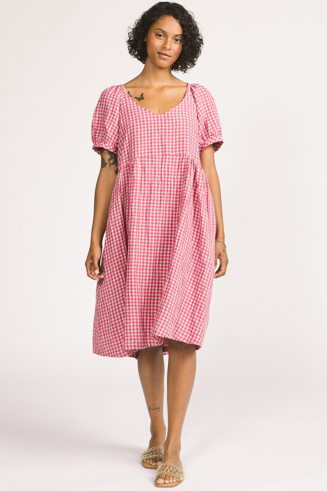 Verity Dress by Allison Wonderland, Pink Gingham, V-neck, slightly puffed short sleeves with gathers at cuffs, gathers at front back and sides, below the knee length, pockets, 100% linen, sizes 2-12, made in Vancouver