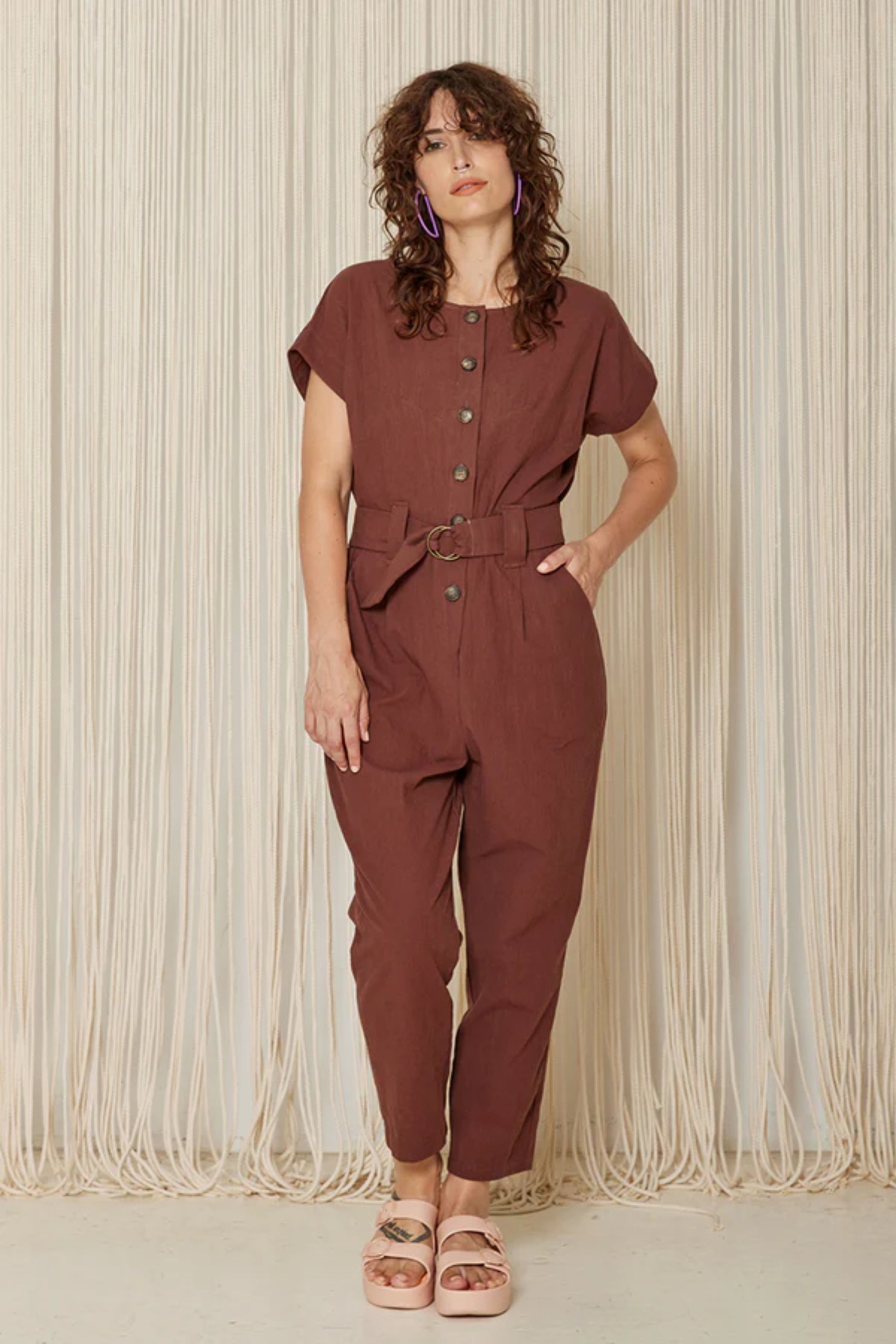 Arnica Jumpsuit by Cokluch, Sumac, short extended sleeves, round neck, front button placket, loop-buckle belt at waist, ankle-length, eco-fabric, cotton, sizes XS to XL, made in Montreal 