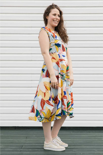 Riley Dress by Copious, Blue/Yellow floral, round neck, cap sleeves, A-line shape, cinched empire waist, tea length, eco-fabric, cotton and linen, sizes XS to L, made in Ottawa