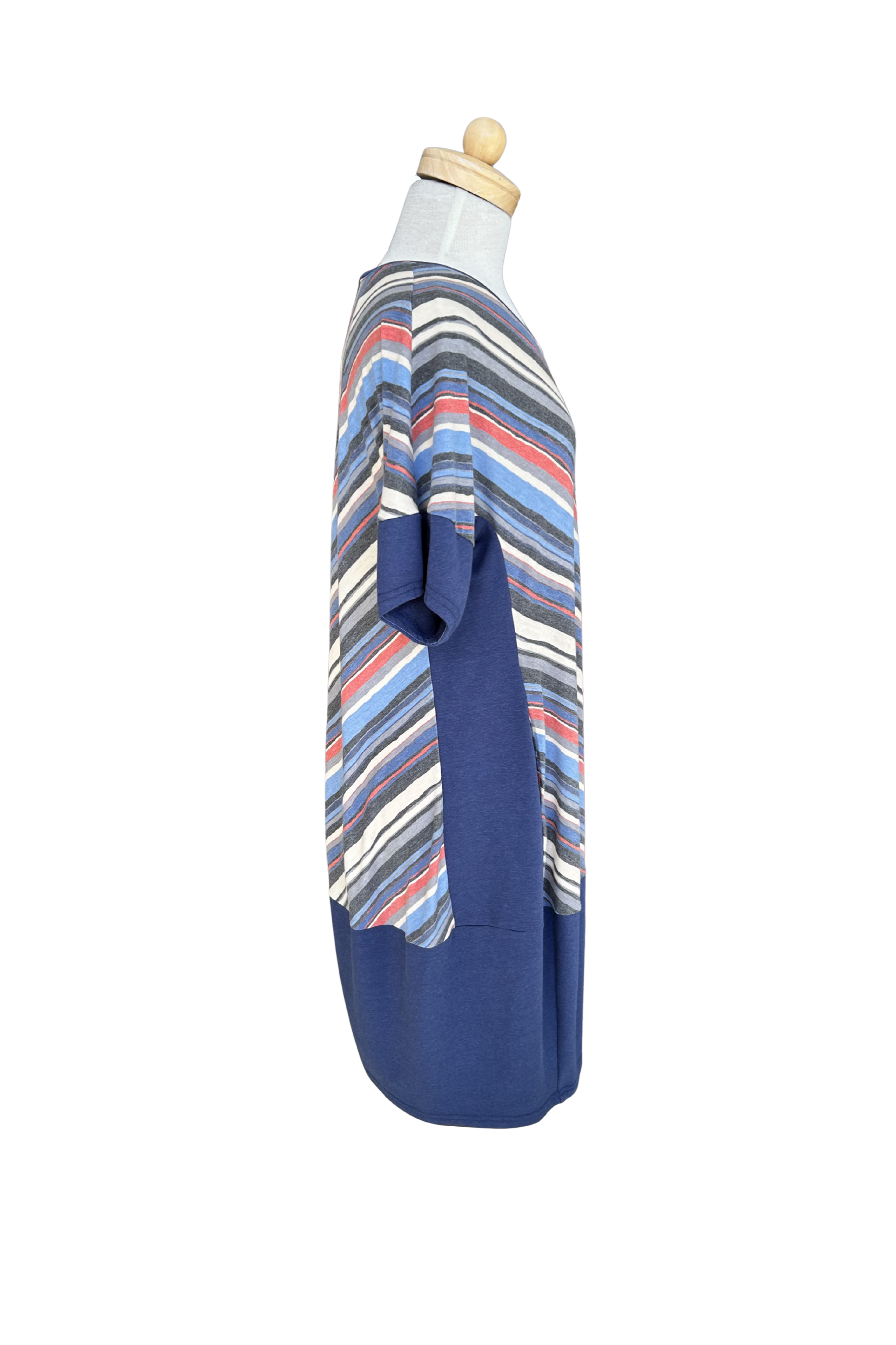 A side view of the Brianna Dress by Solomia is shown on a mannequin against a white background. 