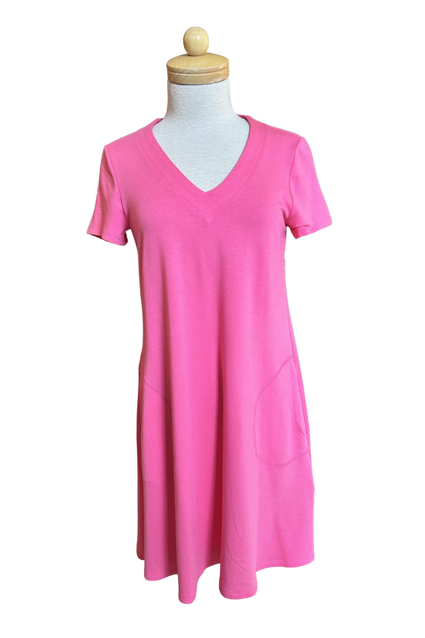 The Gaia Dress by Pure Essence in Peony, a short sleeved knee length dress with a V-neck, A-line shape, and pockets, is shown on a mannequin against a white background.