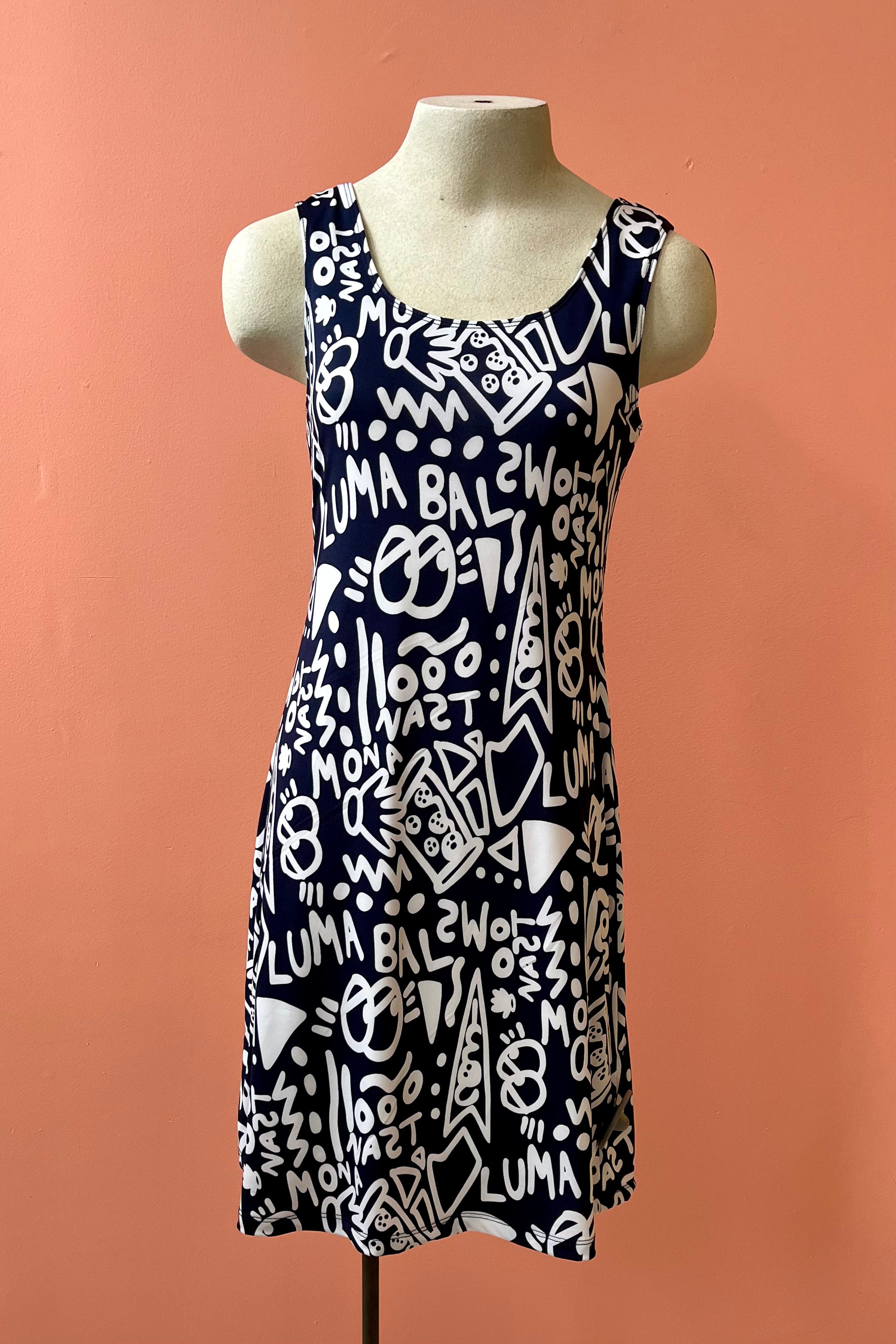 Phillips Dress by Yul Voy, black and white graffiti print, scooped neck front and back, tank dress, wide straps, fit and flare shape, above the knee, sizes XS to XXL, made in Montreal