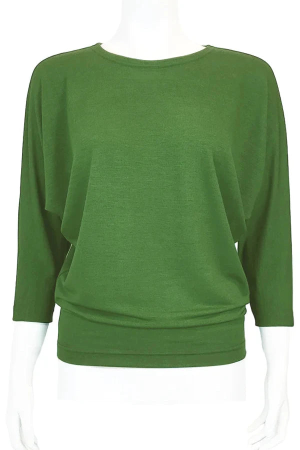 The Jo Slouch Tee by Mandala in Avocado is shown on a mannequin in front of a white background 

