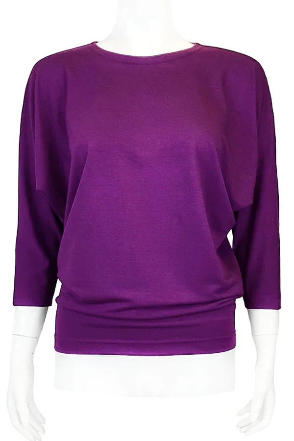 The Jo Slouch Tee by Mandala in Mulberry, shown on a mannequin in front of a white background 