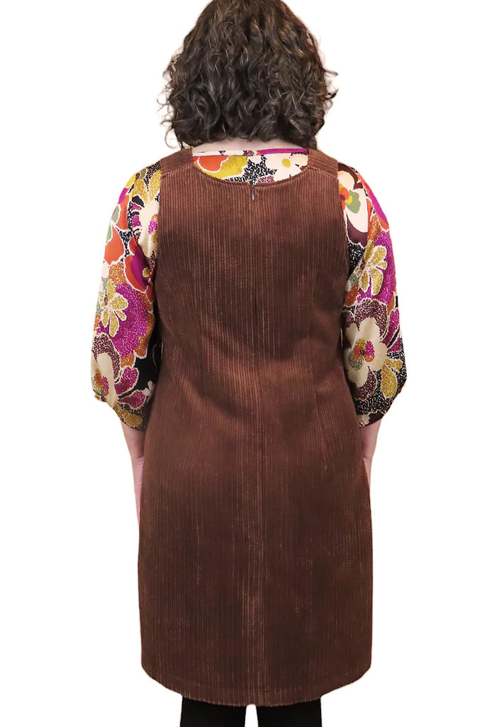 Joni Corduroy Jumper by Mandala, Copper, back view, V-neck, wide straps, decorative buttons, band at waist, hip pockets, sizes XS to XXL, made in Ontario