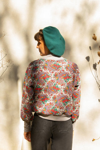 Kiki Top by Kazak, Paisley, back view, raglan sweatshirt, 100% end-of-lot cotton, grey ribbed bamboo/cotton trim at cuffs, collar, and hem, sizes XS to L, made in Montreal