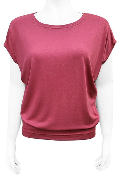 The Mandala Charlie Slouch Tee in Dusty Rose, with a round neck, short extended sleeves, and a fitted hem, is shown on a mannequin against a white background. 