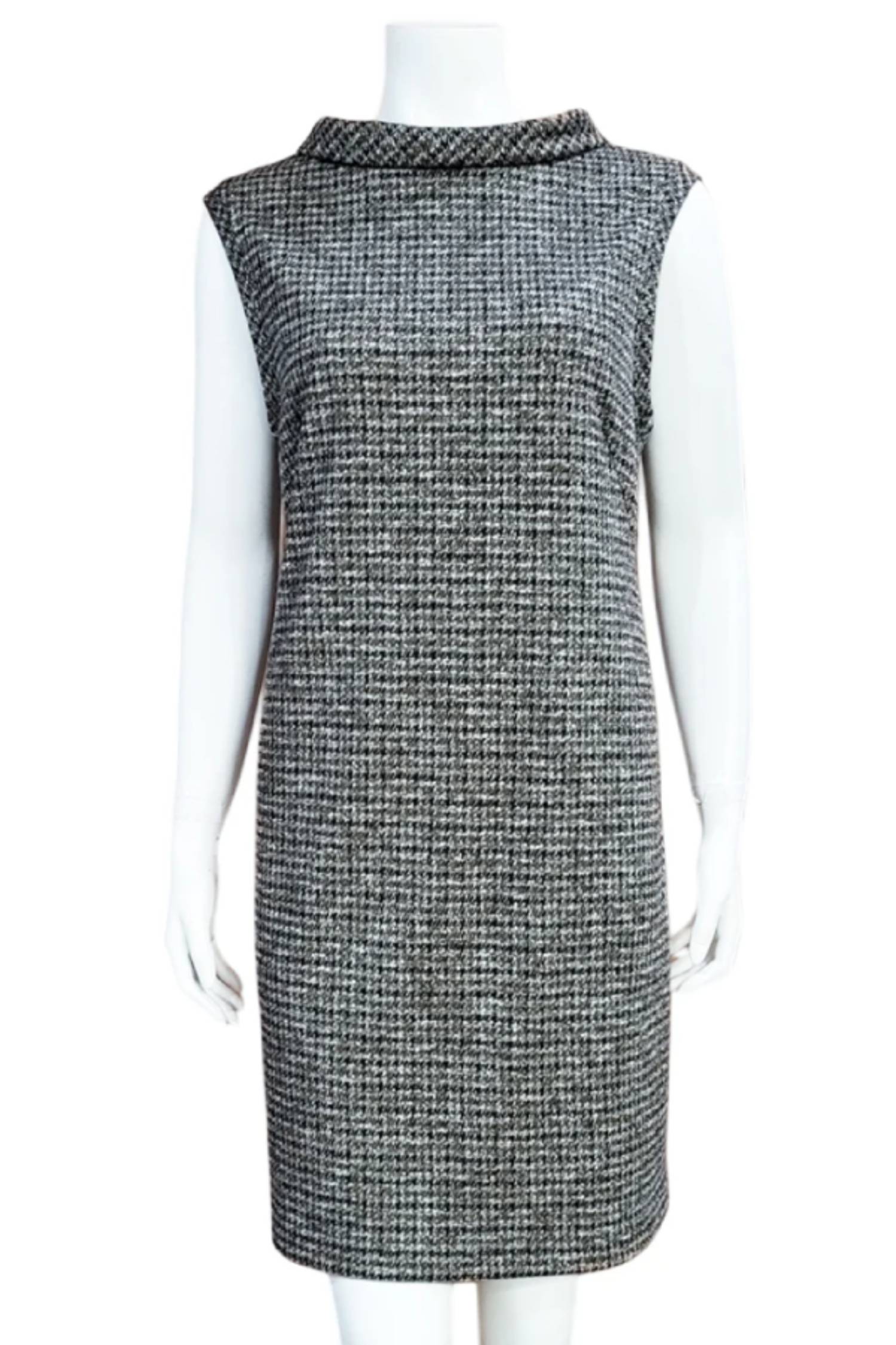 The Harris Check Tunic by Mandala in Red, a sleeveless tweed tunic with a roll collar and French darts, is shown on a mannequin against a white background. 