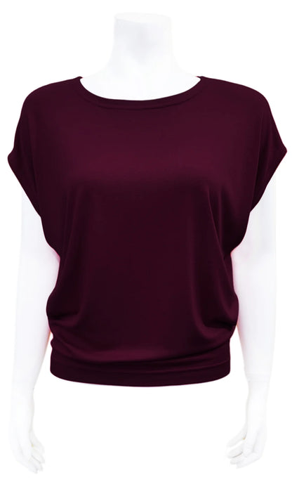 The Mandala Charlie Slouch Tee in Blackberry, with a round neck, short extended sleeves, and a fitted hem, is shown on a mannequin against a white background. 