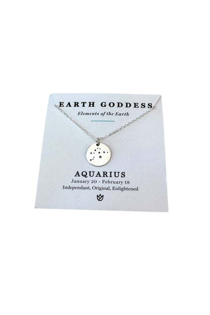 Necklace with Aquarius zodiac charm on a 'Earth Goddess' branded card.