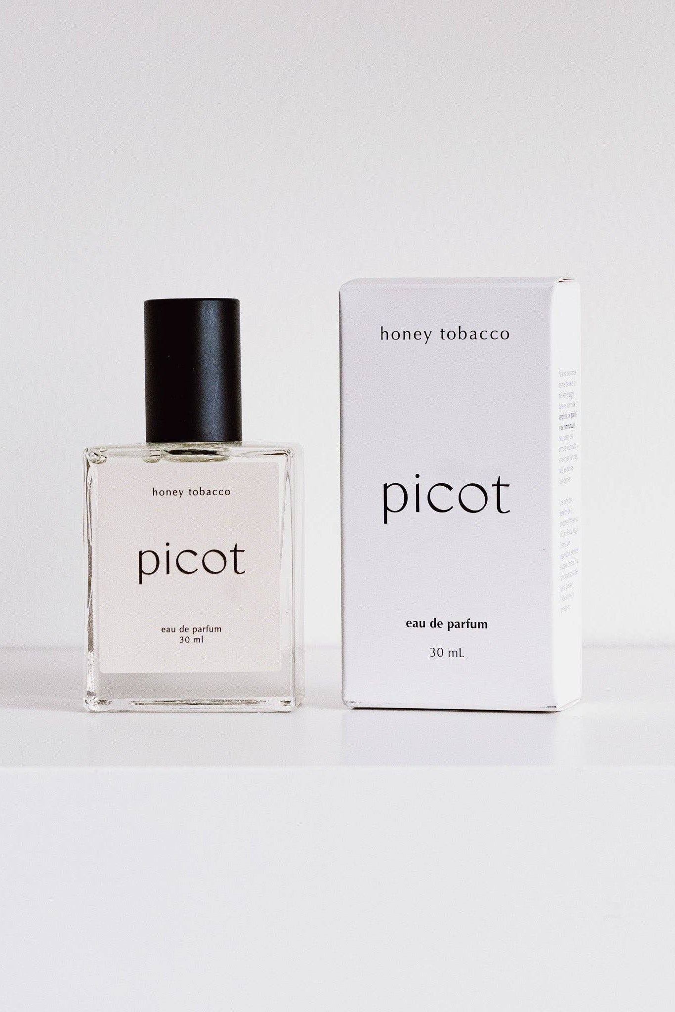 Picot Honey Tobacco eau de parfum bottle and packaging on a white background