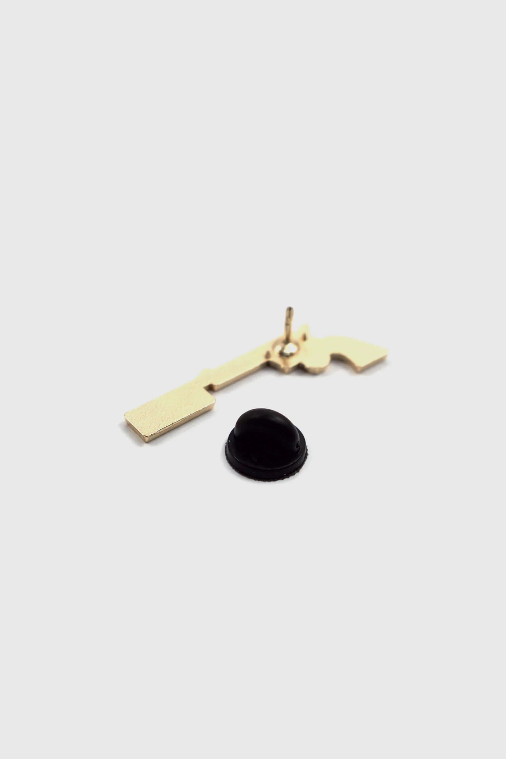 A back view of The Bad Bitch Pin by Badaboöm Studio is shown against a white background. 