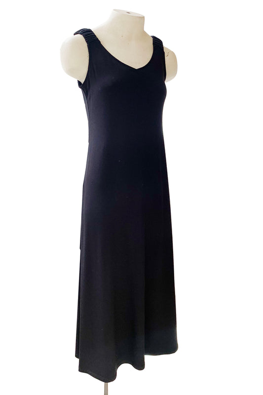 Mary Tank Dress by Compli K, Black, back view, wide straps with ruching detail at the shoulders, V-neck at front and back, slight A-line shape, ankle length, eco-fabric, bamboo/viscose, sizes XS to XXL, made in Montreal 