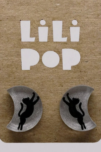 Moon shaped earrings with black cat silhouettes on a Lili Pop branded card.