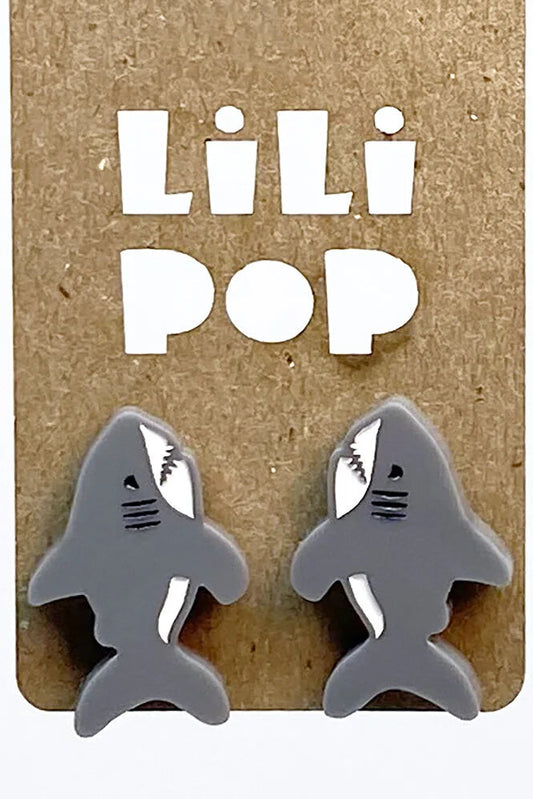 Shark-shaped earrings on a 'Lili Pop' branded card