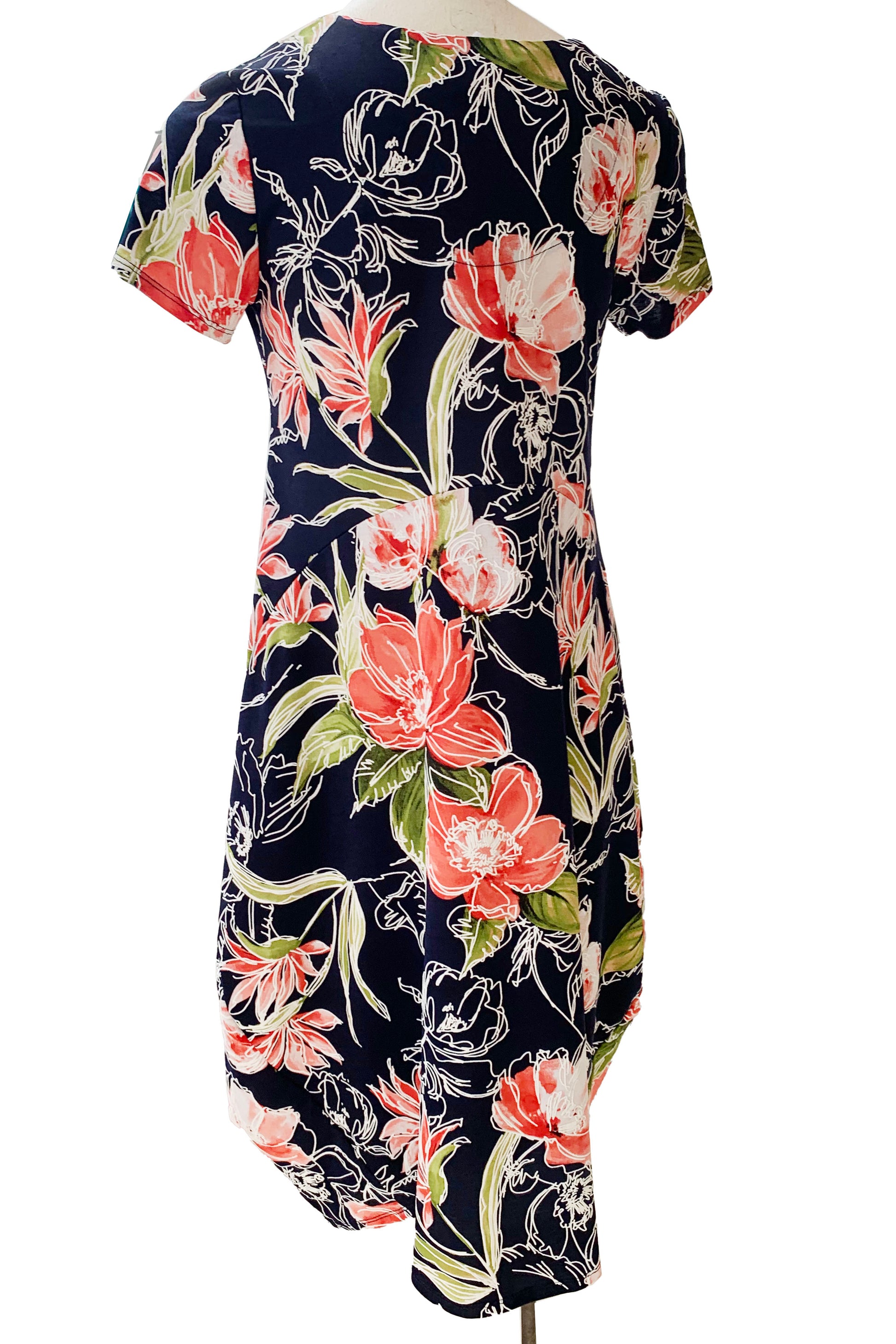 Maddy Dress by Compli K, Navy Floral, back view, short sleeves, round neck, arched seams across the bodice, rounded hem, below the knee, sizes XS to XXL, made in Montreal 