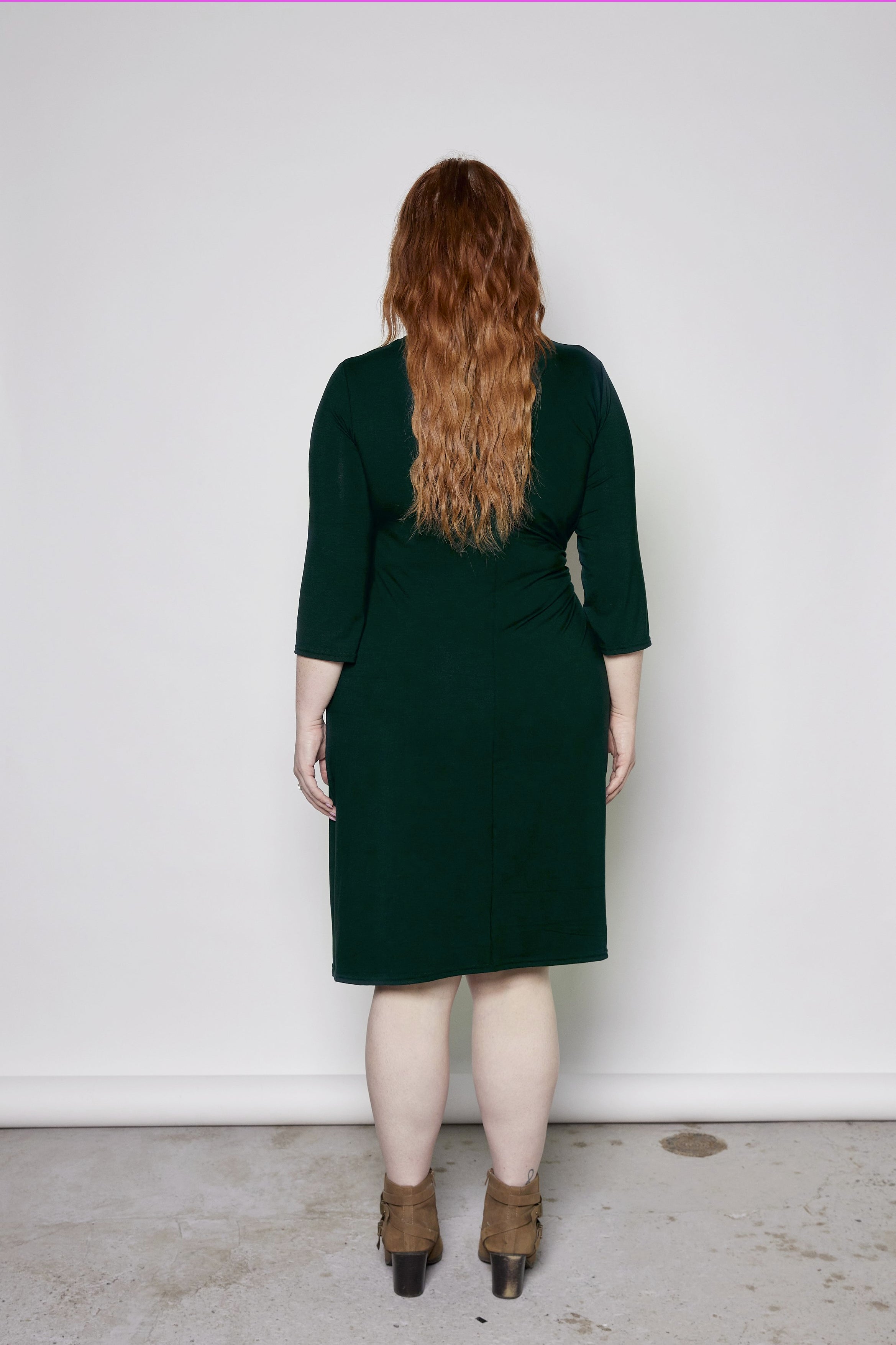 Mariela Dress by Tangente, Evergreen, back view, asymmetrical, draping at waist, built-in ties, 3/4 sleeve, anti-pill jersey, sizes XS to XXL, made in Ottawa