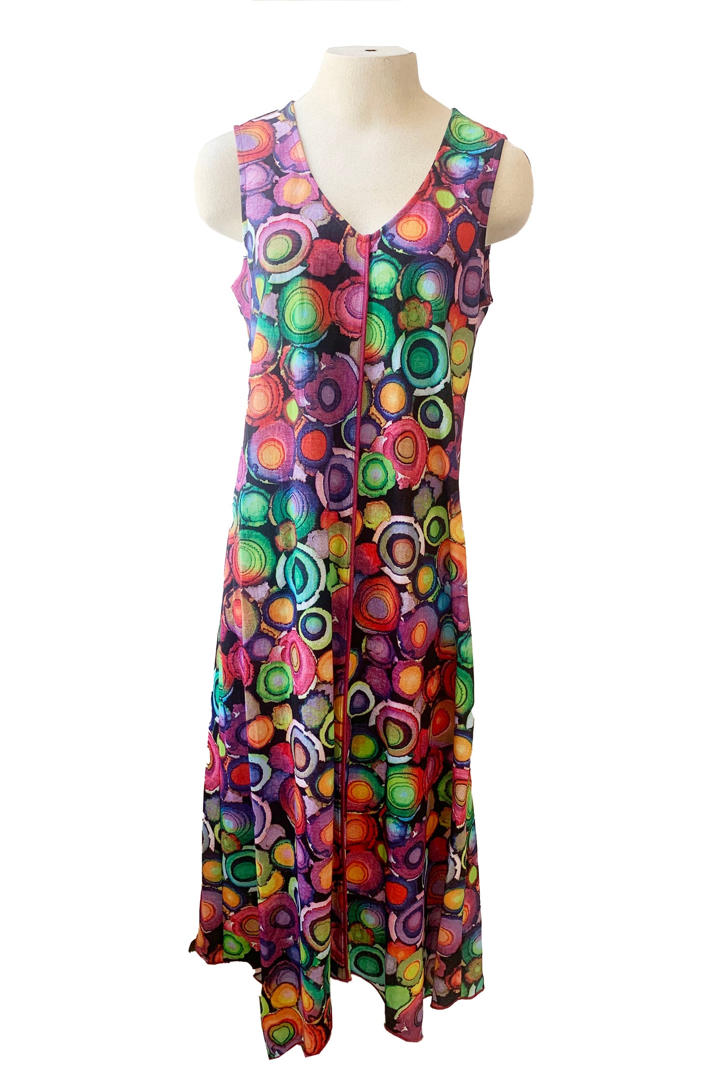 The Camryn Dress by Pure Essence, featuring a multicolour circles print, is shown on a mannequin against a white background 