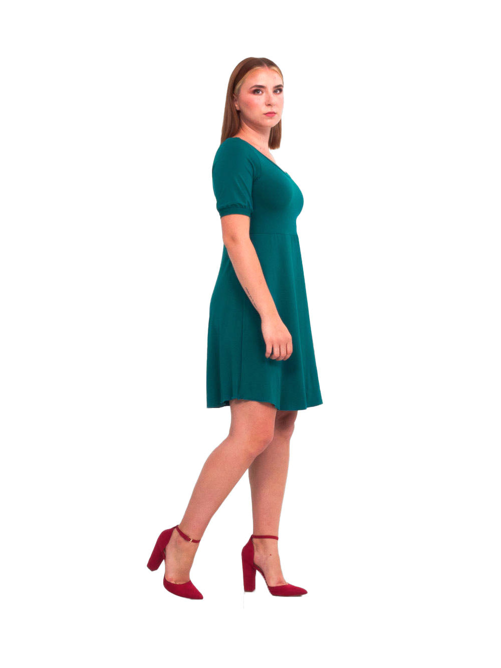 Petillante Dress by Slak, Turquoise, side view, round neck, short slightly puffed sleeve with bands at the cuffs, fit and flare shape, circular skirt is shorter at the side seams, eco-fabric, bamboo, sizes XS to XXL, made in Montreal 