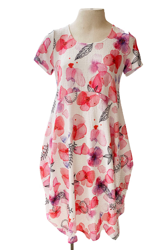 Maddy Dress by Compli K, Pink Floral, short sleeves, round neck, arched seams across the bodice, rounded hem, below the knee, sizes XS to XXL, made in Montreal 