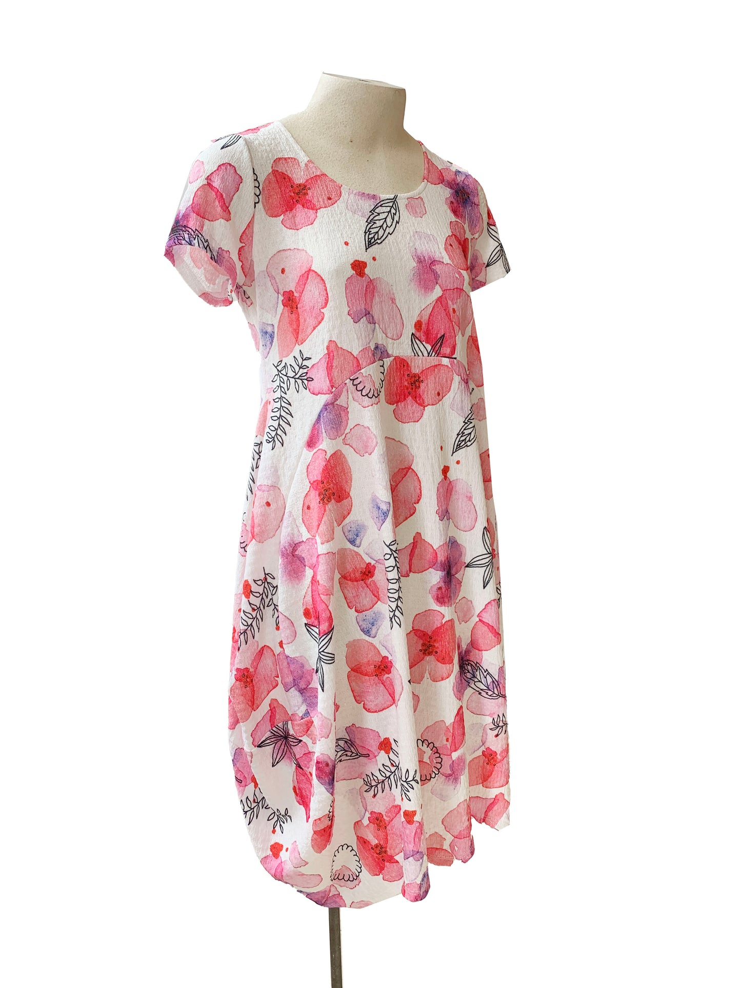 Maddy Dress by Compli K, Pink Floral, short sleeves, round neck, arched seams across the bodice, rounded hem, below the knee, sizes XS to XXL, made in Montreal 
