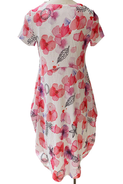 Maddy Dress by Compli K, Pink Floral, back view, short sleeves, round neck, arched seams across the bodice, rounded hem, below the knee, sizes XS to XXL, made in Montreal 