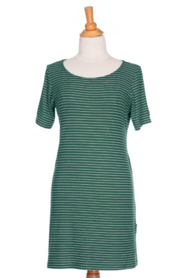 The Boogie Dress by Rien ne se Perd in Green/White Stripe, a t-shirt dress with a wide neck, side pocket, and slit and coconut button detail on the short sleeves, is shown on a mannequin in front of a white background. 