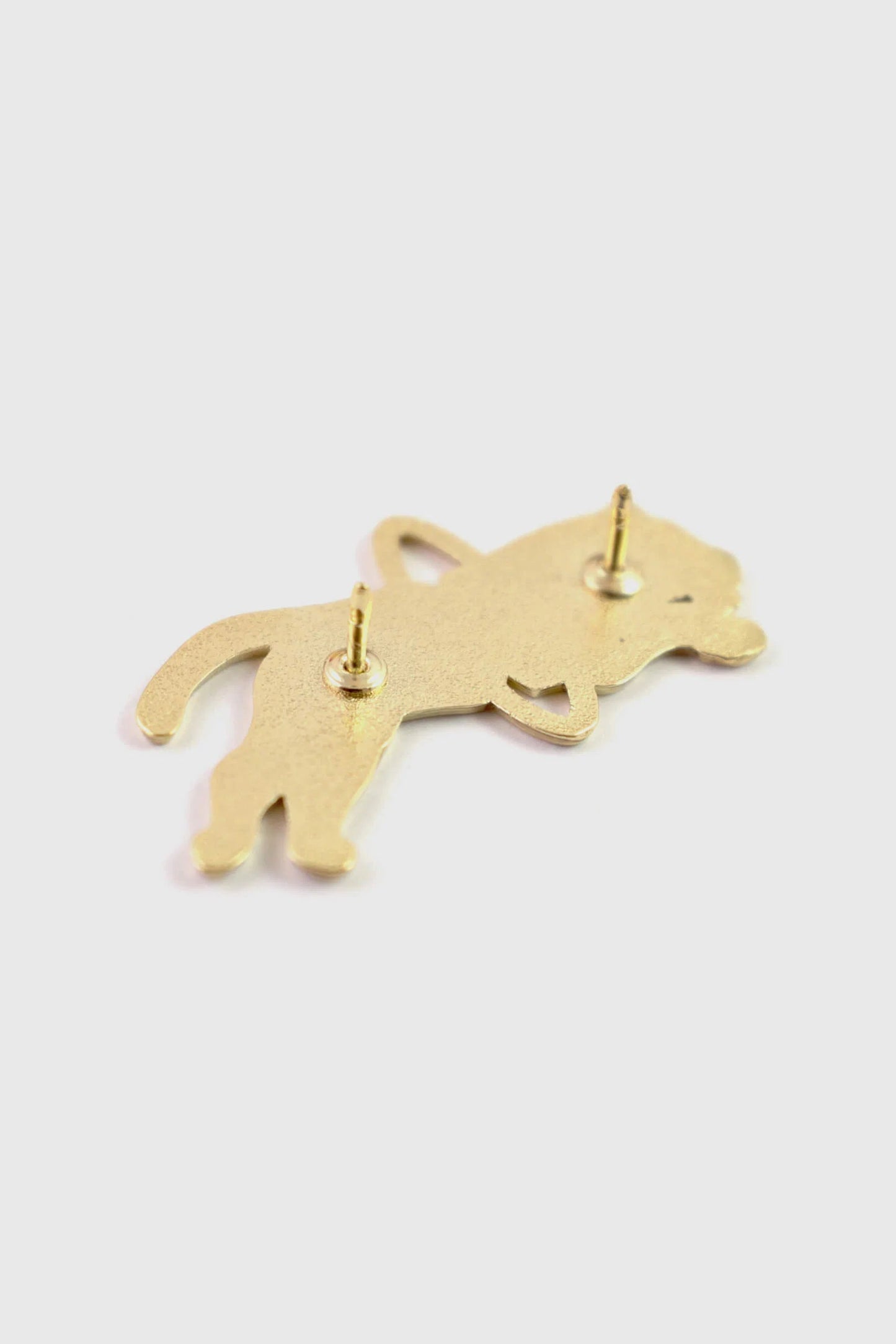 A back view of the Tiger Pin by  Badaboöm studio is shown against a white background. 