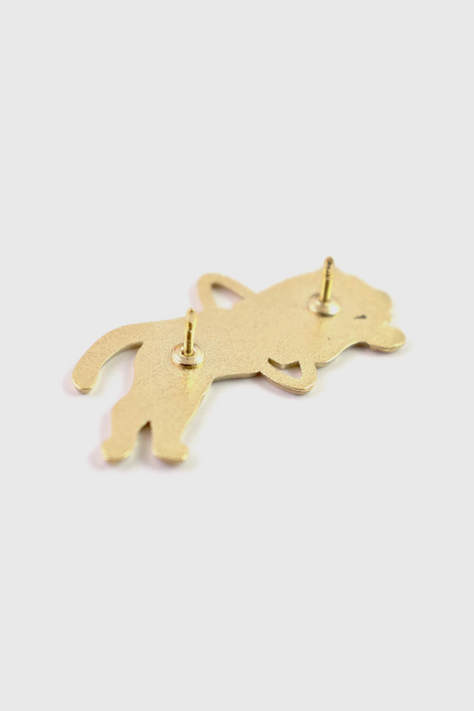 A back view of the Tiger Pin by  Badaboöm studio is shown against a white background. 
